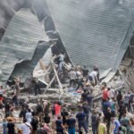 Rescuers work at Ohmatdyt Children's Hospital that was damaged during a Russian missile strikes, in Kyiv