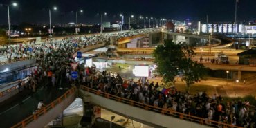 People attend a protest against Rio Tinto's lithium mining project, in Belgrade