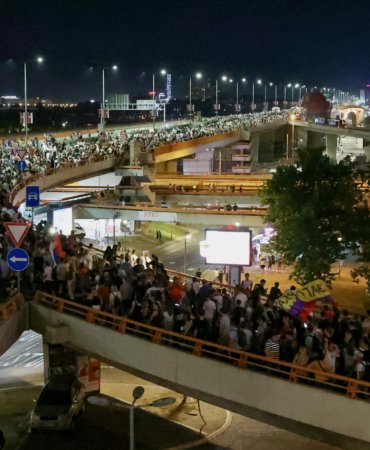 People attend a protest against Rio Tinto's lithium mining project, in Belgrade